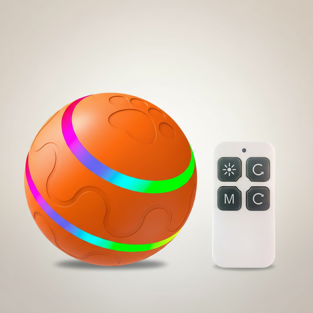 Orange ball with colorful band and remote control on a light gray background