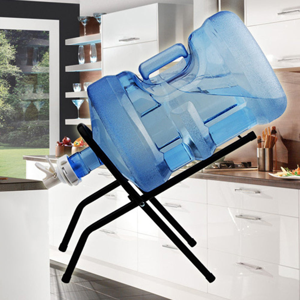 Blue water dispenser on a black stand in a kitchen setting