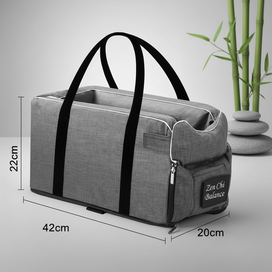 Gray duffel bag with black straps and dimensions on a light gray background
