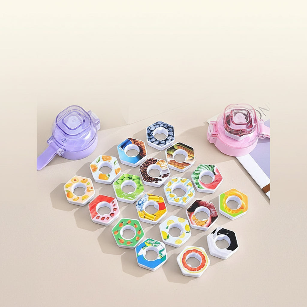 Colorful donut-shaped cookie cutters on a beige background