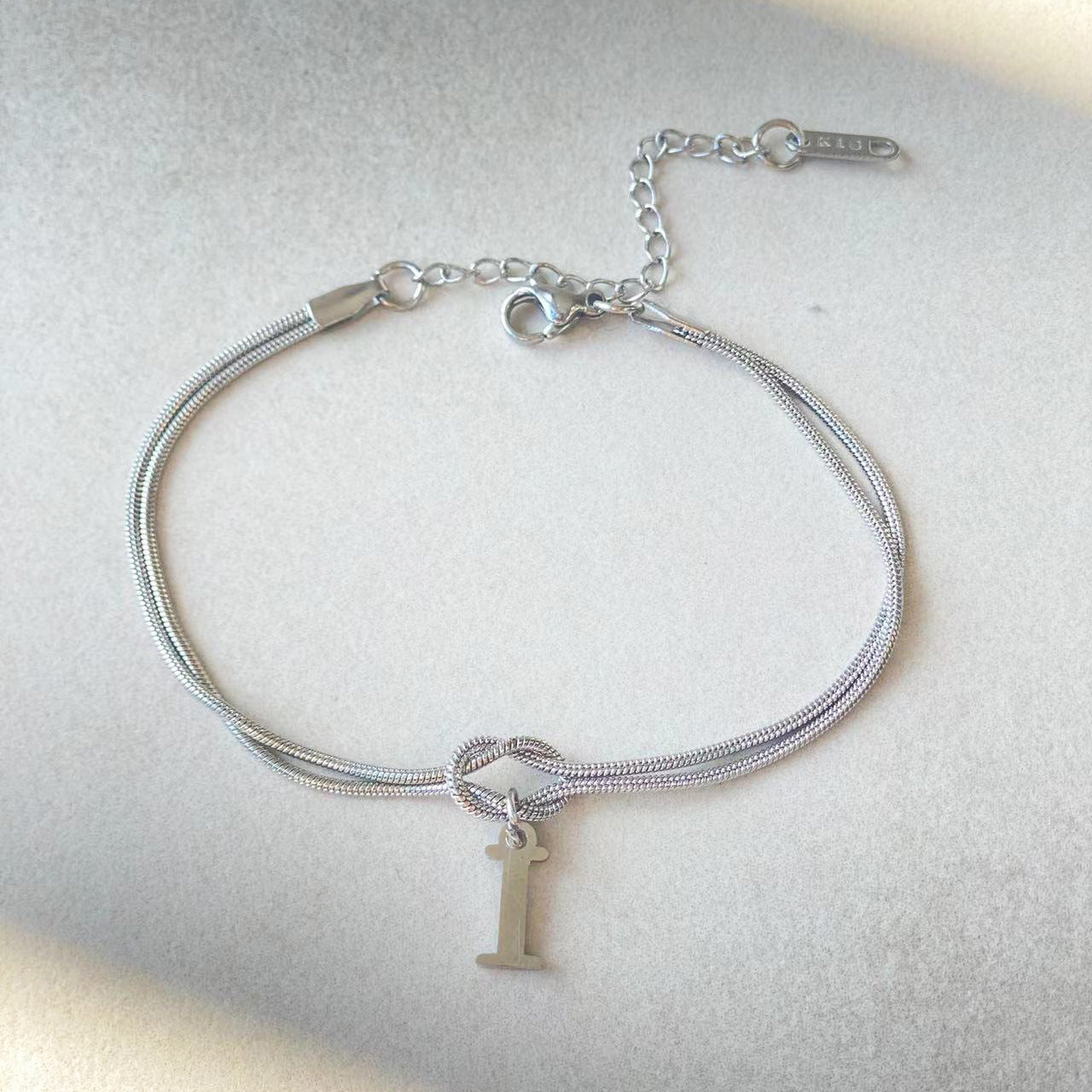 Love Knot Bracelet in Stainless Steel Letters