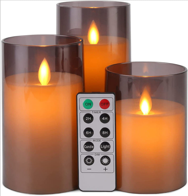 Glass-plated LED candle trio with moving flame and remote control.