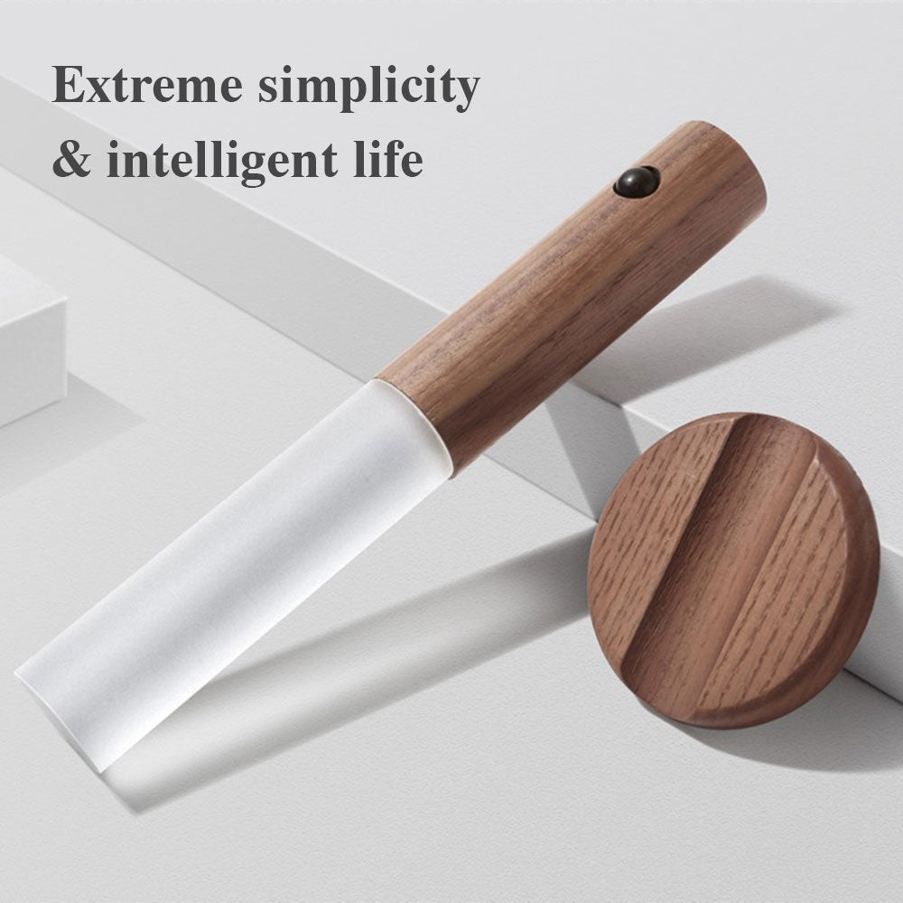 Wooden tool with white blade on a light gray background, featuring text 'Extreme simplicity & intelligent life'.