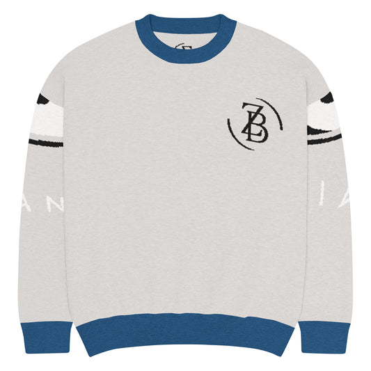 Gray sweater with blue and white accents on a white background